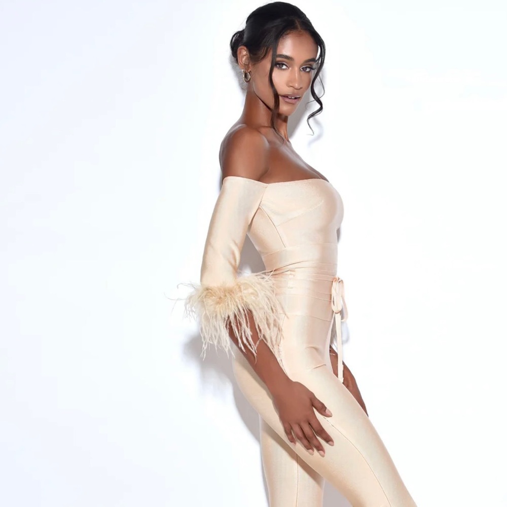 Brand new, never worn Quella Beige off shoulder feather sleeve bandage jumpsuit